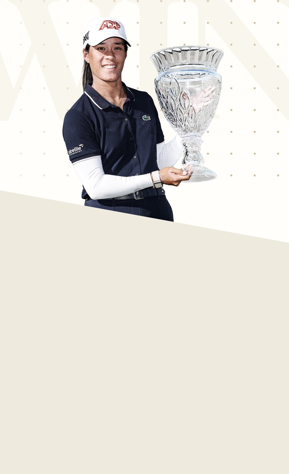 Person holding a large trophy against a plain background