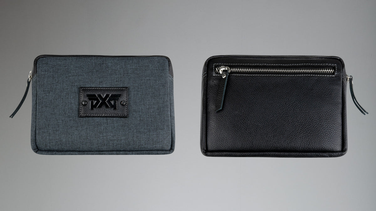 PXG black cash bag with a black leather zipper handle and a PXG logo on the front on a white background